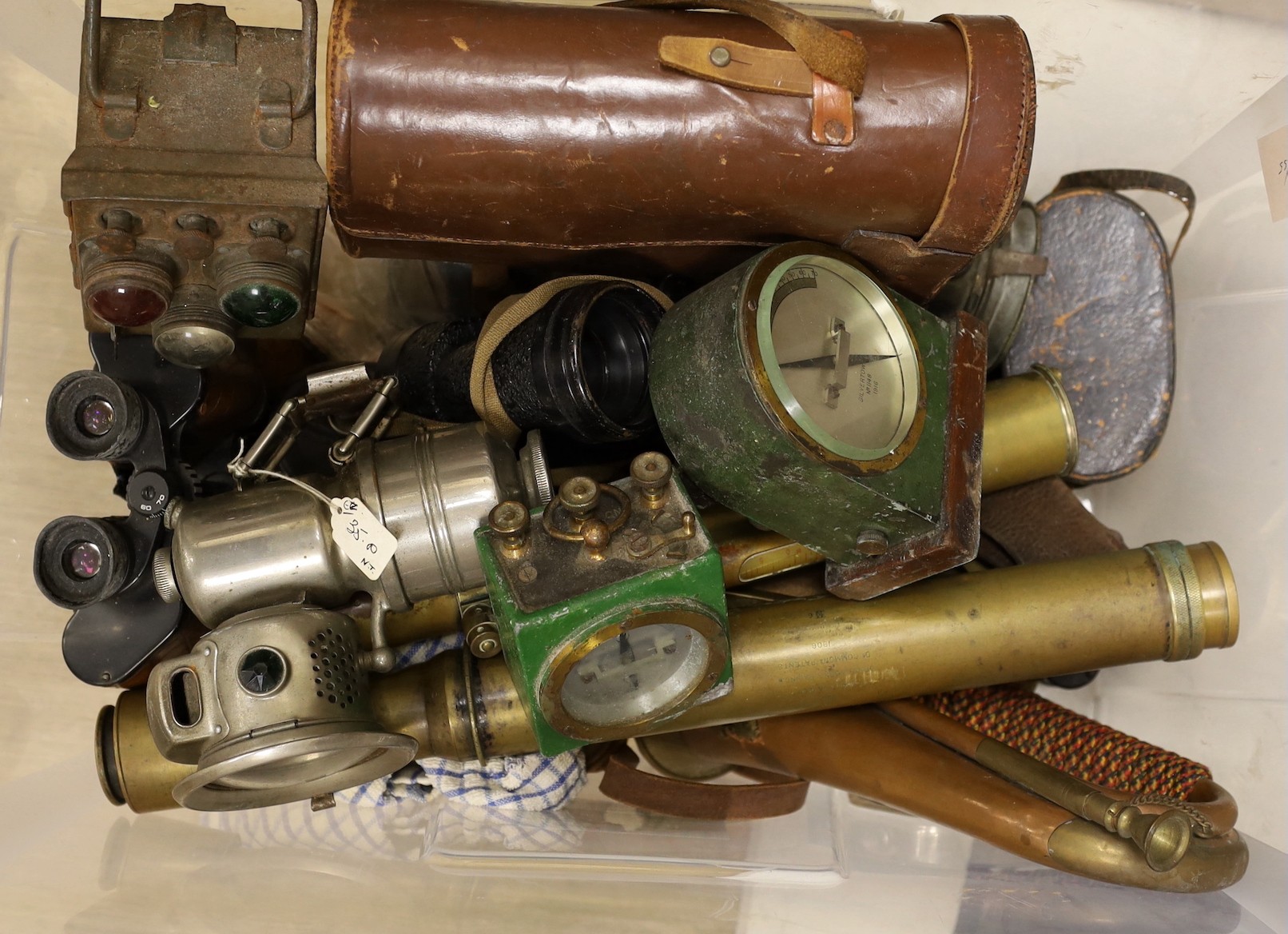 Various binoculars, a bugle, Stanley dumpy level, etc.